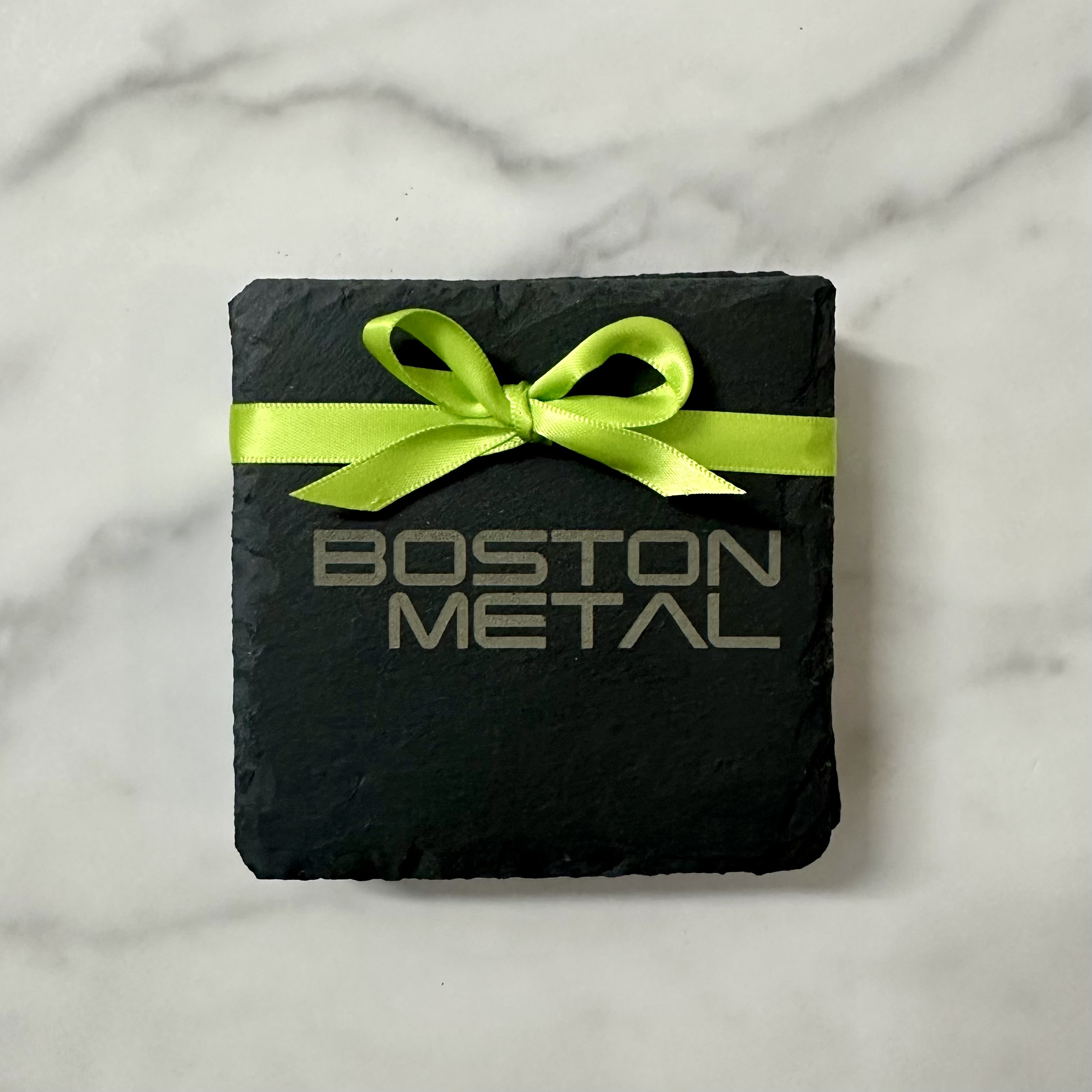 Custom corporate logo engraved on slate coaster